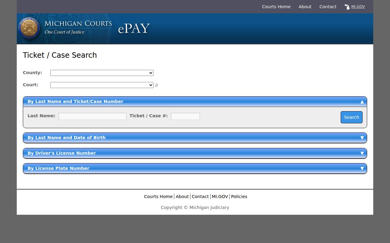 Michigan eCourts ticket search page showing the fields used to look up Mackinac County traffic warrant records